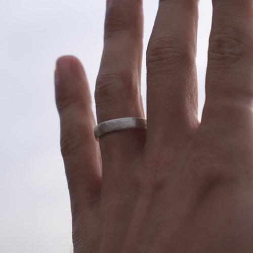 Handmade mens sterling silver hammered wedding band